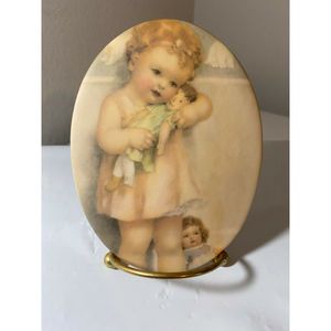 Musical Plaque with picture by Bessie Pease Gutmann "Love is Blind"